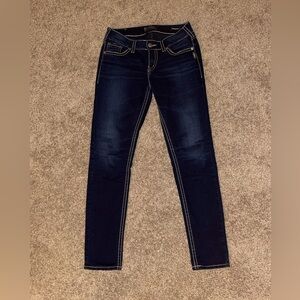 Silver Suki mid rise super stretch skinny jeans.